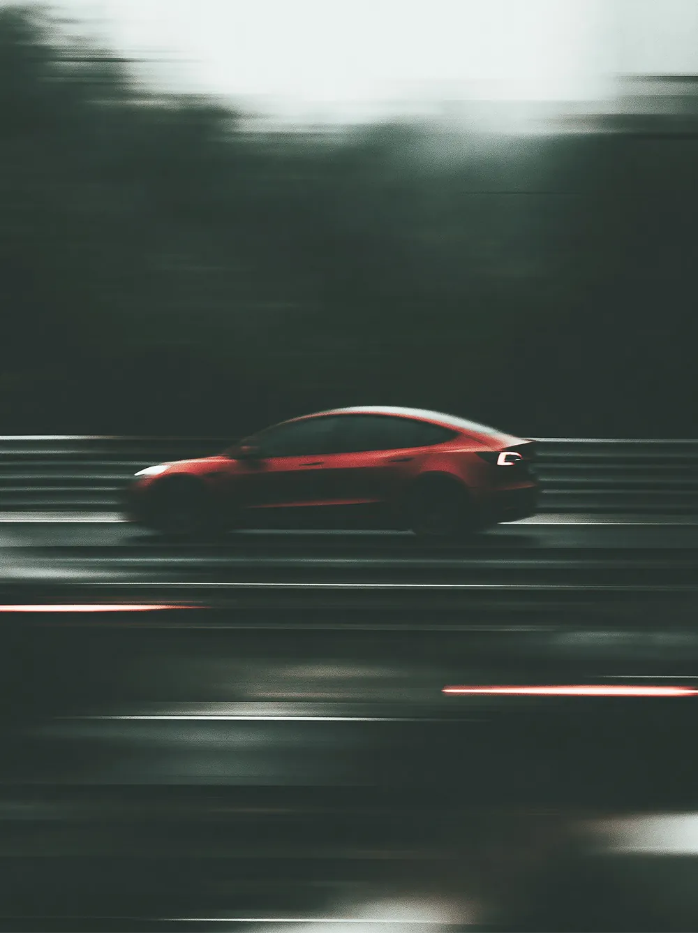 AI-generated image of a red car in motion on a race track